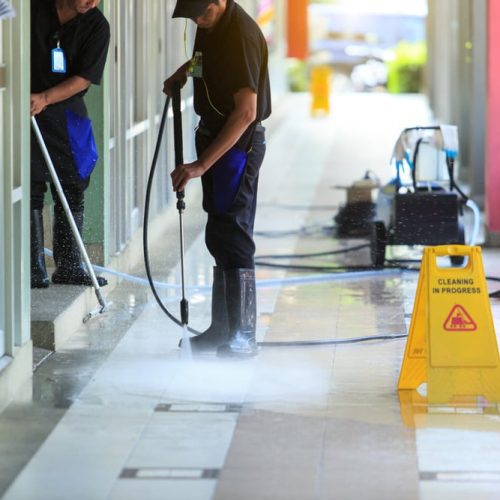 Man cleaning the ground floor